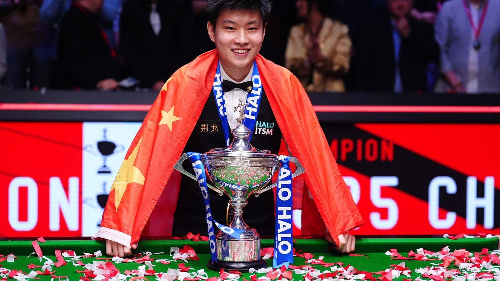 Zhao Xintong becomes first player from China to win snooker world championship as he beats Mark Williams 18-12